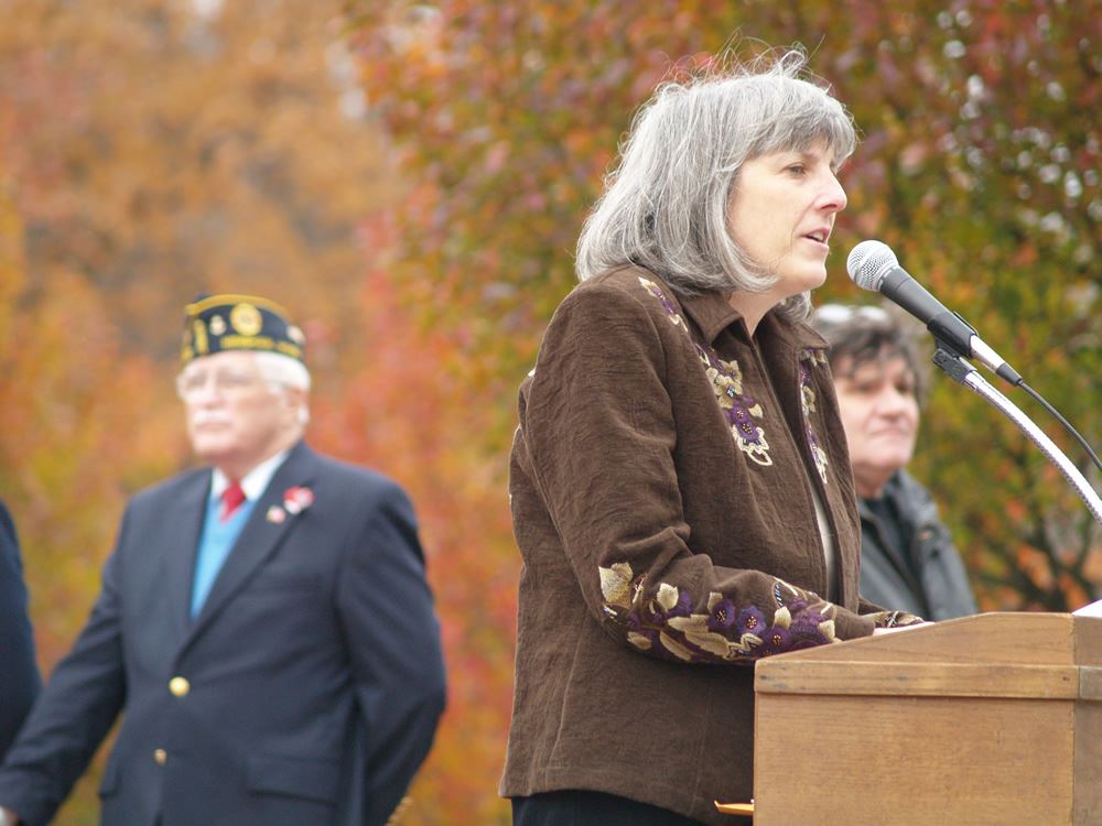 Speaker 5 at Podium